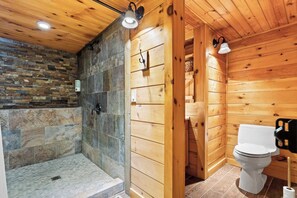 Shower, hair dryer, towels, shampoo