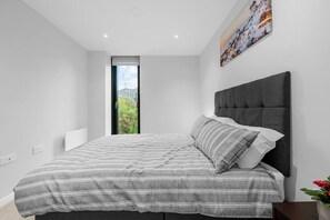 2 bedrooms, desk, iron/ironing board, travel crib