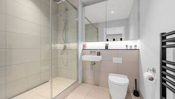 Hair dryer, towels, soap, shampoo