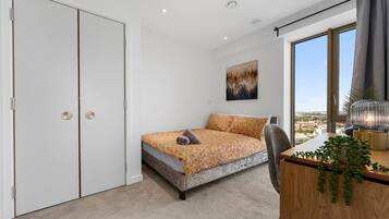 2 bedrooms, desk, iron/ironing board, travel cot