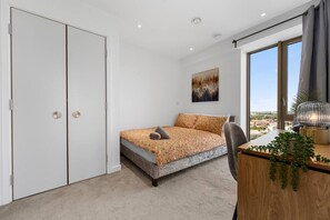 2 bedrooms, desk, iron/ironing board, travel cot