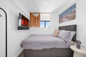 2 bedrooms, desk, iron/ironing board, travel crib