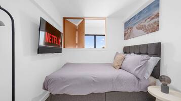 Desk, iron/ironing board, travel cot, free WiFi
