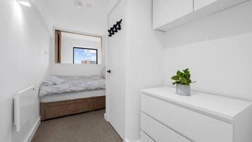 2 bedrooms, desk, iron/ironing board, travel cot