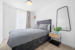 2 bedrooms, desk, iron/ironing board, travel crib