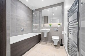 Hair dryer, towels, soap, shampoo