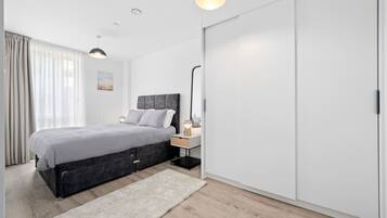 2 bedrooms, desk, iron/ironing board, travel crib