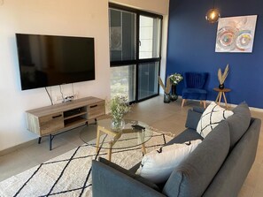 Flat-screen TV, fireplace