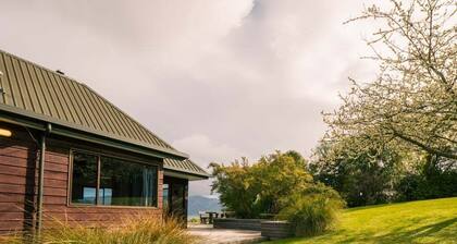 Port Watch – Relaxed Kiwi Bach Over Akaroa Harbour