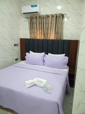 Deluxe Room, City View | Desk, laptop workspace, blackout curtains, soundproofing - Wiings Hotel & Banquet (Uyo)