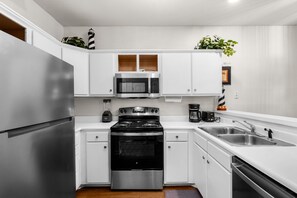 Fridge, microwave, oven, stovetop - River Oaks Unit 2H Su (Myrtle Beach)