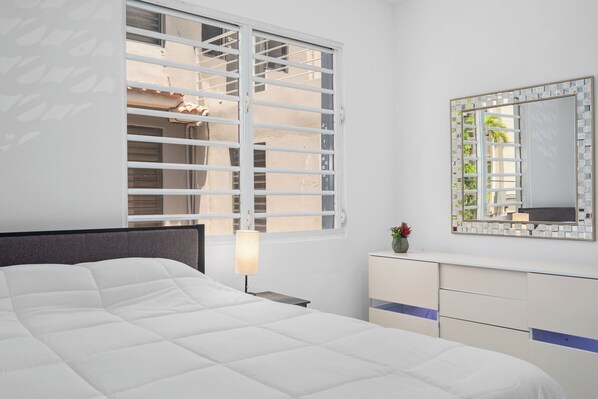 1 bedroom, desk, iron/ironing board, travel cot