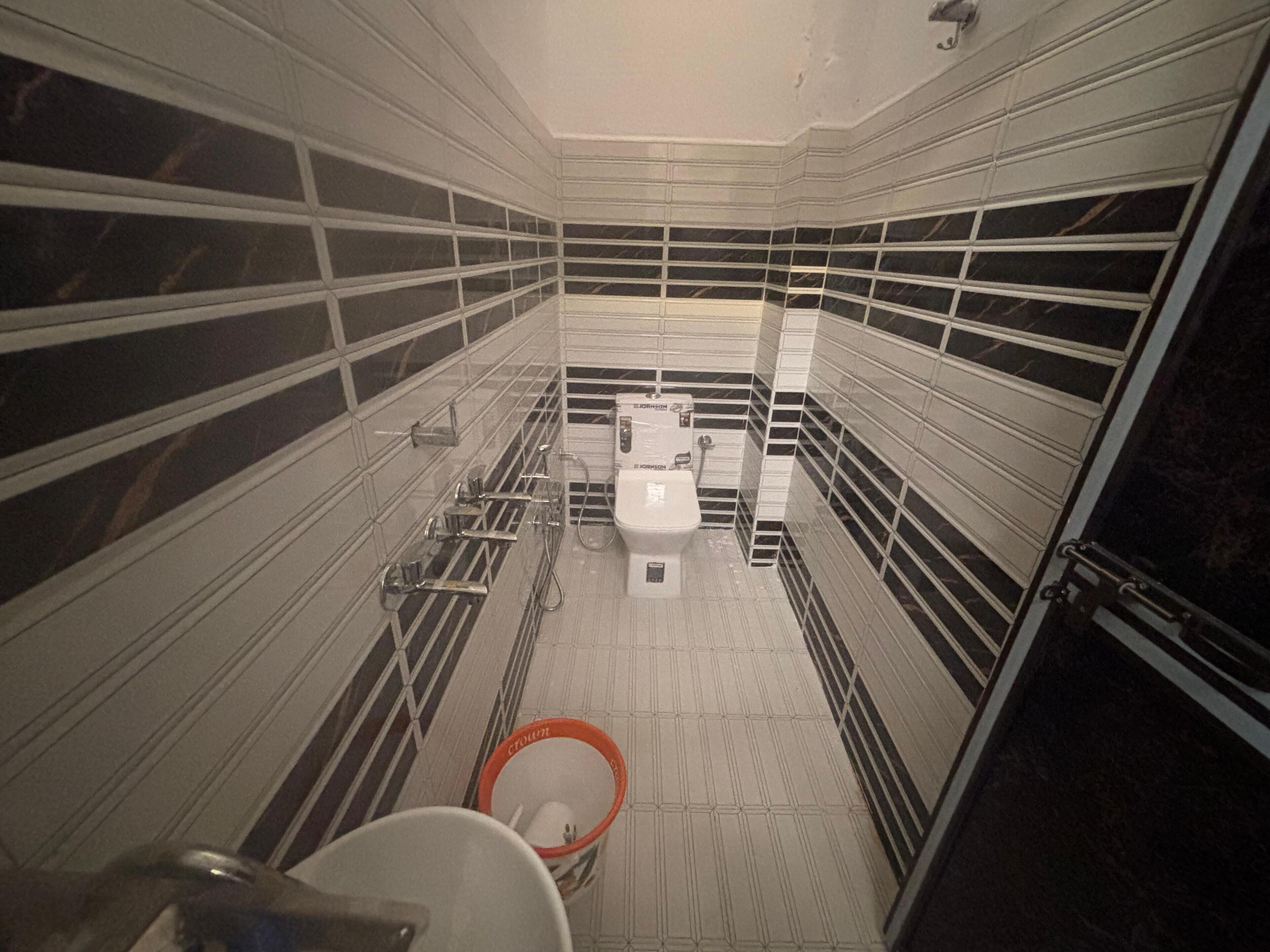 Shower, free toiletries, slippers, towels