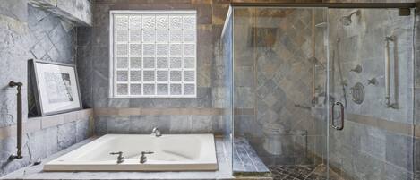 A bathroom with a large bathtub, a glass-enclosed shower, and a window with a decorative grid pattern.