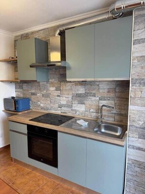 Fridge, microwave, oven, cookware/dishes/utensils