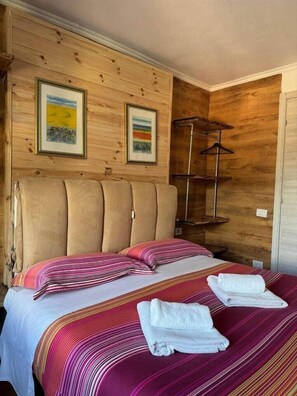 1 chambre, fer et planche à repasser, Wi-Fi gratuit, draps fournis