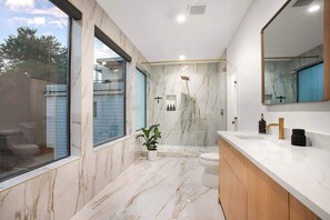 Shower, hair dryer, towels