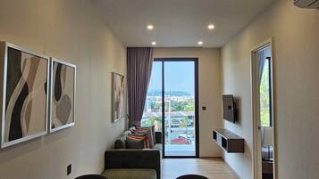 Premium Quadruple Room, Pool View | Room amenity