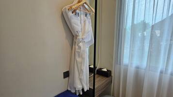 Premium Quadruple Room, Pool View | Room amenity