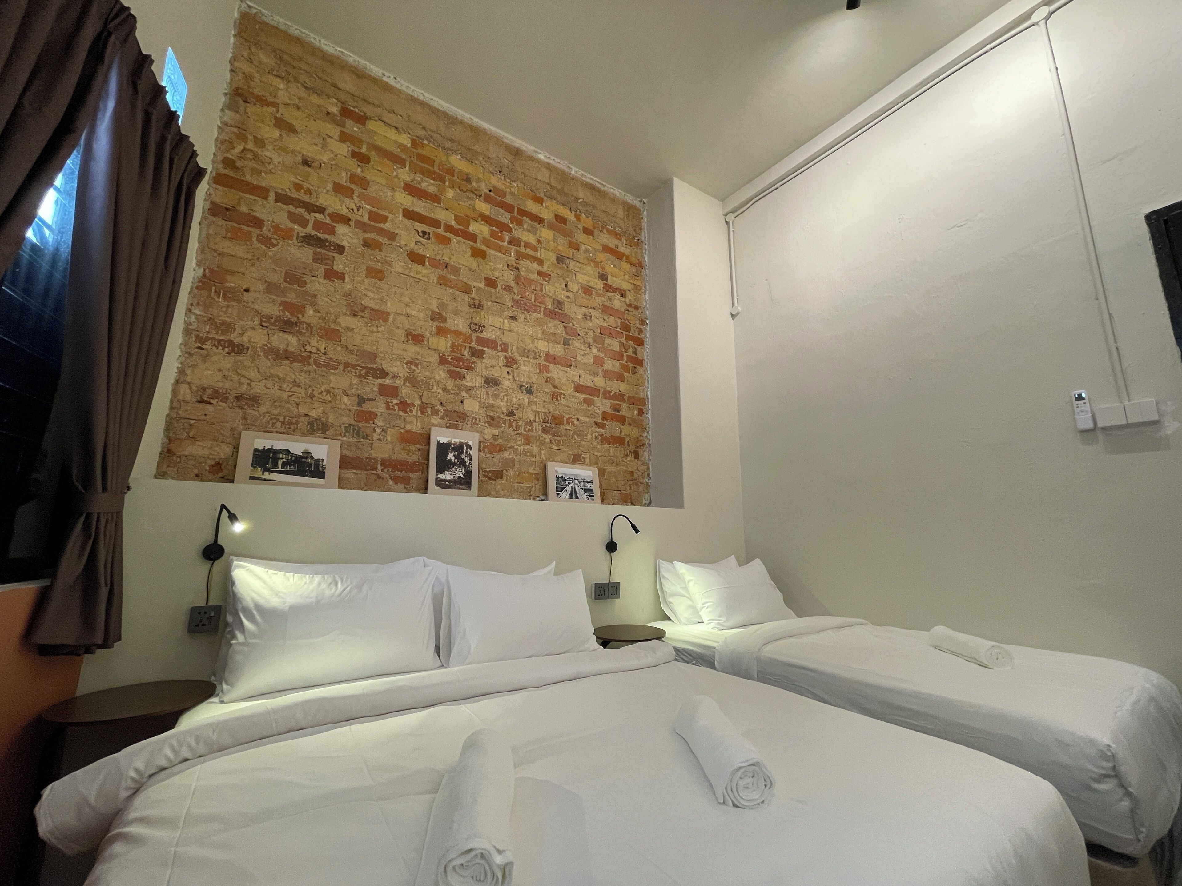 Family Triple Room, City View | Blackout curtains, iron/ironing board, free WiFi