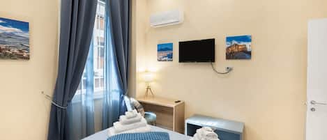 2 dormitorios, tabla de planchar con plancha, wifi y ropa de cama