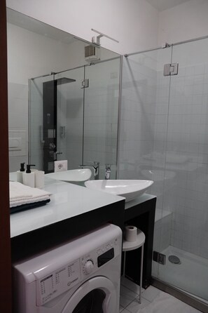 Hair dryer, towels, soap, toilet paper