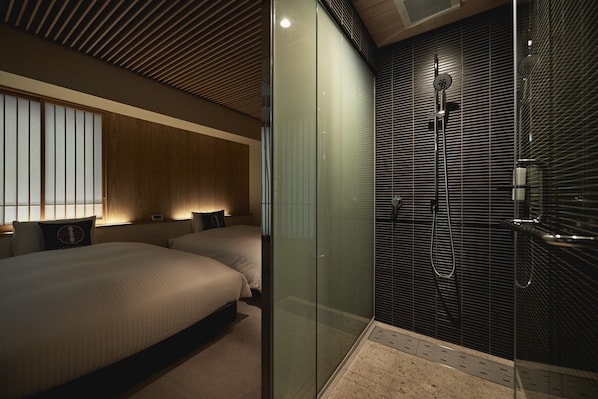 Standard Twin Room | Bathroom | Hair dryer, slippers, bidet, towels