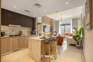 Luxury Apartment, Balcony | Living area