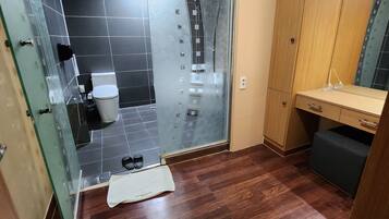 Hair dryer, slippers, towels, shampoo