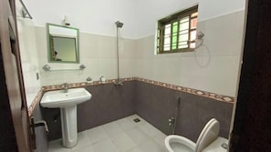 Shower, towels, soap, toilet paper