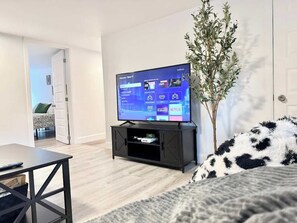 Iron/ironing board, travel crib, WiFi, bed sheets