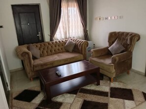 Luxury Studio Suite, Balcony, City View | Living area