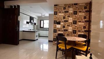 Luxury Twin Room, City View | Living room | 50-inch Smart TV with digital channels