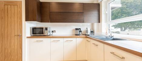 Fridge, microwave, dining tables