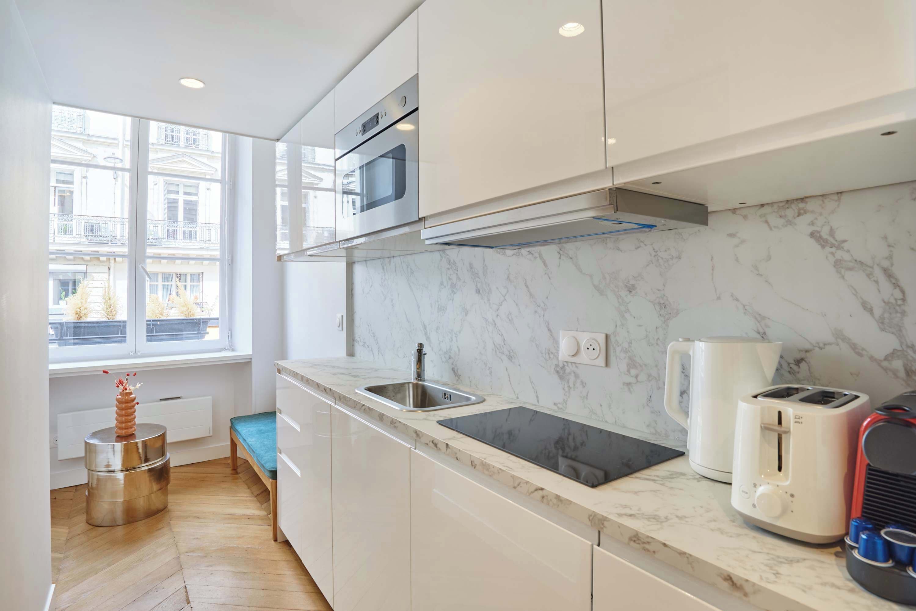 Fridge, microwave, stovetop, coffee/tea maker