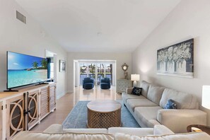 TV, offices - Serene Lakefront Condo with Pool (Naples)