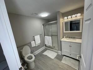 Hair dryer, towels, soap, toilet paper