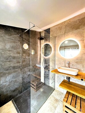 Shower, free toiletries, hair dryer, bathrobes