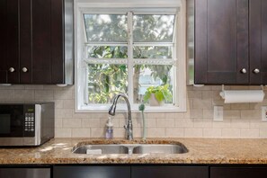 Fridge, microwave, oven, stovetop - Porch & Palm | 3BR Home w/ Porch & Pet-Friendly (Tampa)