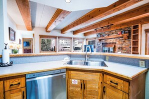 Fridge, coffee/tea maker, cookware/dishes/utensils