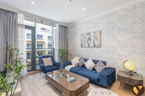 Luxury Apartment, Balcony, City View | Iron/ironing board, cribs/infant beds, free WiFi, bed sheets - Peaceful Chaimaa Park Near Circle Mall (Dubai)