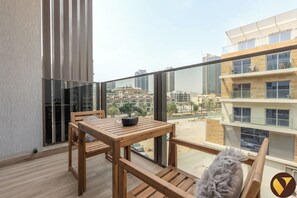 Luxury Apartment, Balcony, City View | Iron/ironing board, cribs/infant beds, free WiFi, bed sheets - Peaceful Chaimaa Park Near Circle Mall (Dubai)