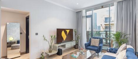 Luxury-Apartment, Balkon, Stadtblick | Wohnbereich