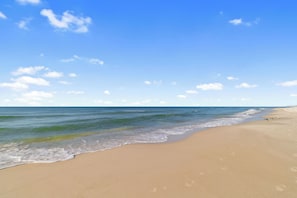 A beach with clear skies and calm waters. - Windward Pointe 1102 by Liquid Life (Orange Beach)