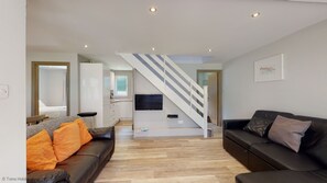 4 slaapkamers, een strijkplank/strijkijzer, beddengoed