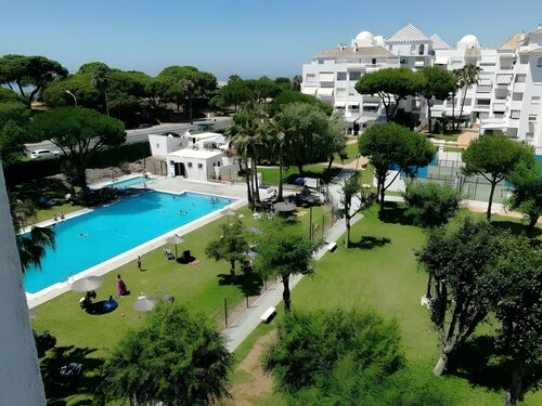 Apartment 'El Portil Pinares' with Shared Pool, Private Terrace and Wi-Fi