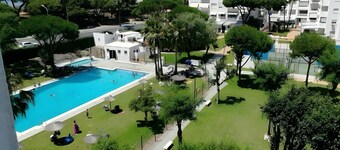 Apartment 'El Portil Pinares' with Shared Pool, Private Terrace and Wi-Fi