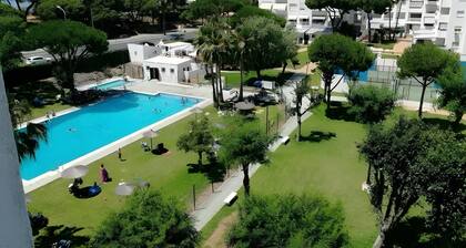 Apartment 'El Portil Pinares' with Shared Pool, Private Terrace and Wi-Fi