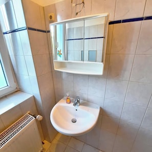 Hair dryer, towels, soap, toilet paper