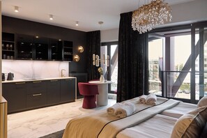 Superior Studio, Balcony, River View | Living area | Flat-screen TV